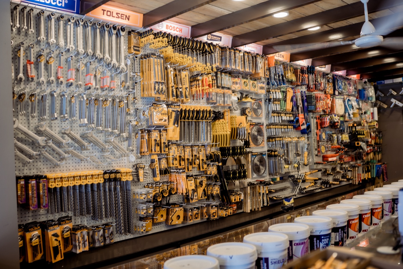 Hand tools and spanners displayed on the wall of the Ceylon Platinum Trading showroom in Matara